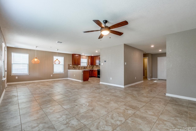 14802 Achilles Dr, San Antonio, TX 78245 - unfurnished living room featuring a ceiling fan, baseboards, recessed lighting, and light tile patterned flooring