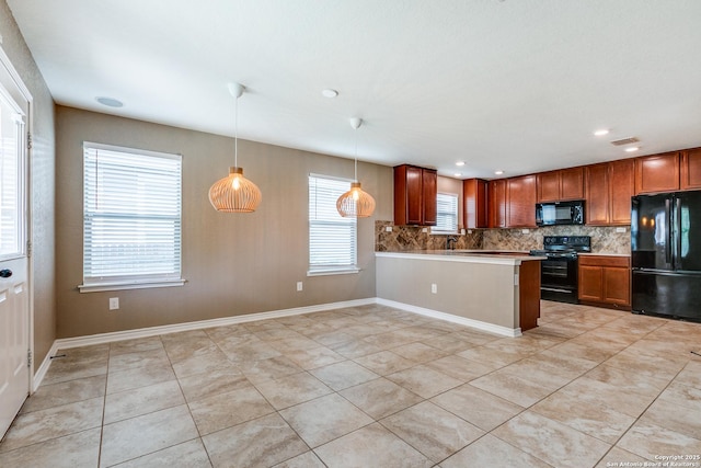 14802 Achilles Dr, San Antonio, TX 78245 - kitchen featuring black appliances, decorative backsplash, light tile patterned floors, a peninsula, and hanging light fixtures