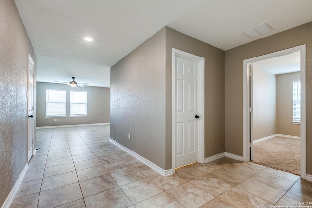 14802 Achilles Dr, San Antonio, TX 78245 - corridor with light tile patterned floors and baseboards