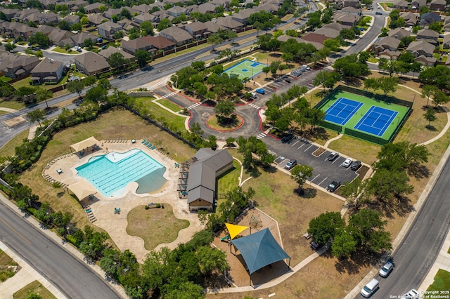 aerial overview of property's location with a pool area