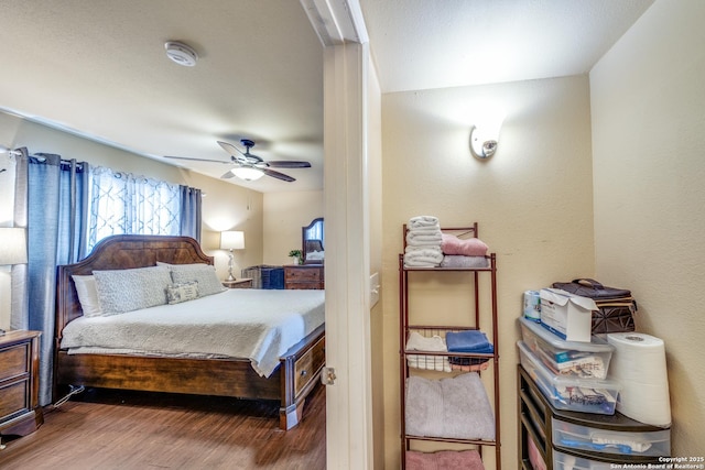 255 E Rampart Unit 401, San Antonio, TX 78216 - bedroom featuring wood finished floors and ceiling fan