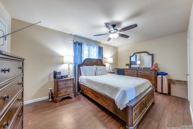 255 E Rampart Unit 401, San Antonio, TX 78216 - bedroom with dark wood-style floors, baseboards, and ceiling fan