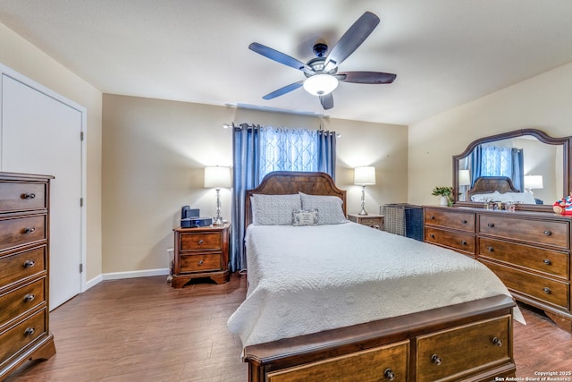 255 E Rampart Unit 401, San Antonio, TX 78216 - bedroom featuring dark wood-style flooring, baseboards, and ceiling fan
