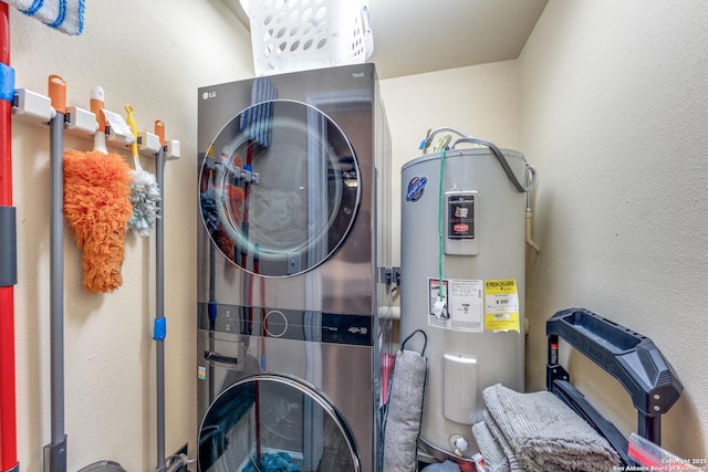 255 E Rampart Unit 401, San Antonio, TX 78216 - laundry area featuring stacked washer / dryer, electric water heater, and a textured wall