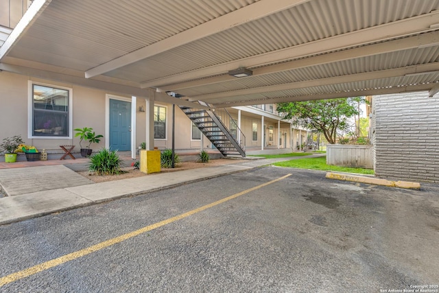 255 E Rampart Unit 401, San Antonio, TX 78216 - covered parking lot with stairs