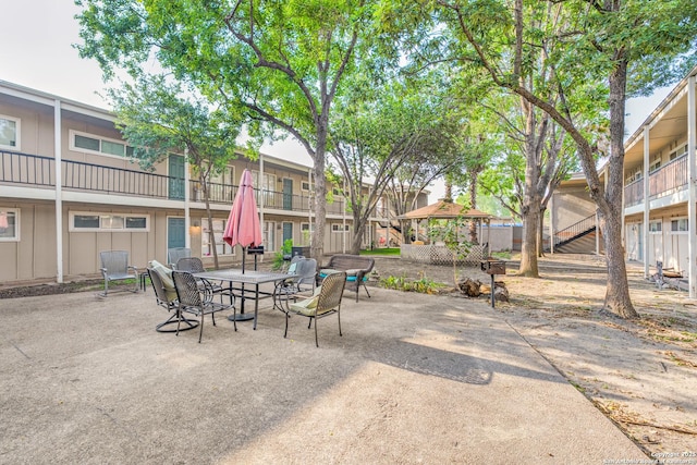 255 E Rampart Unit 401, San Antonio, TX 78216 - view of patio / terrace featuring outdoor dining area