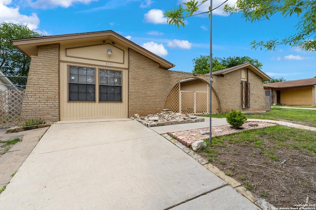 view of front of property with brick siding