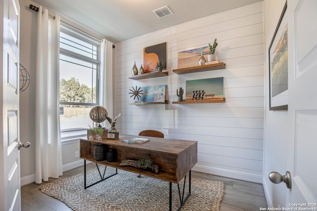 178 Jax Loop, San Antonio, TX 78253 - office space with wood finished floors, healthy amount of natural light, baseboards, and wooden walls