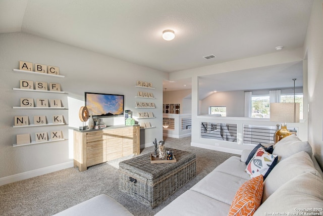 178 Jax Loop, San Antonio, TX 78253 - carpeted living room with vaulted ceiling and baseboards