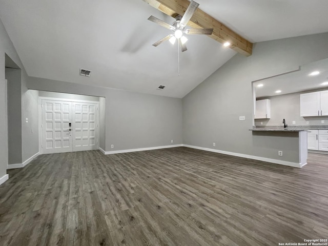 unfurnished living room with dark wood finished floors, a ceiling fan, baseboards, and recessed lighting