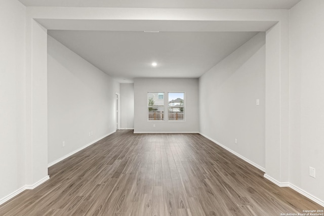 9318 Graze Br, San Antonio, TX 78211 - unfurnished room featuring wood finished floors and baseboards