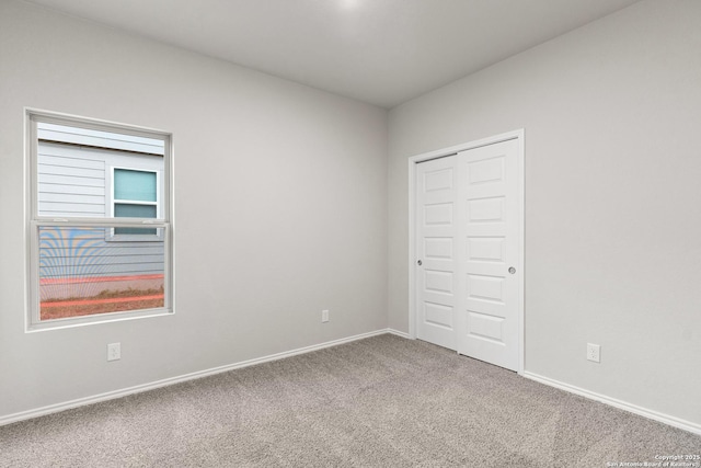 9318 Graze Br, San Antonio, TX 78211 - unfurnished bedroom featuring carpet flooring, baseboards, and a closet