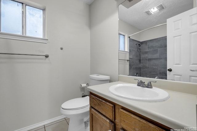 11819 Rousseau, San Antonio, TX 78251 - full bathroom with plenty of natural light, tile patterned flooring, toilet, a shower, and a textured ceiling