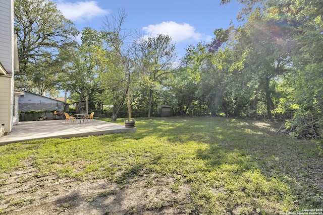 11819 Rousseau, San Antonio, TX 78251 - view of yard with a patio, a storage shed, and an outdoor structure