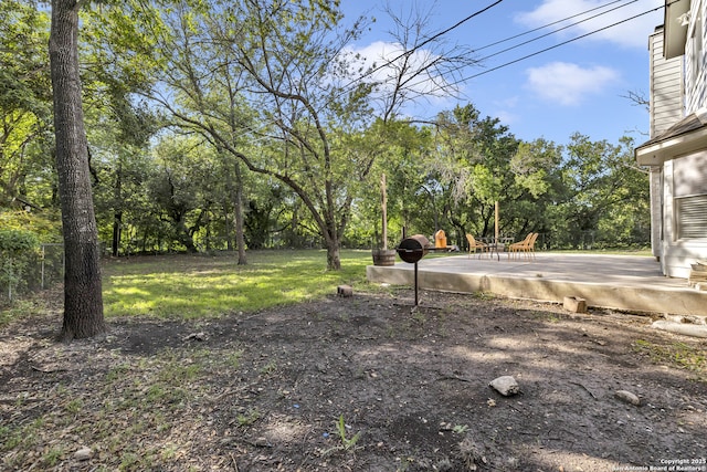 11819 Rousseau, San Antonio, TX 78251 - view of green lawn with a patio and view of wooded area
