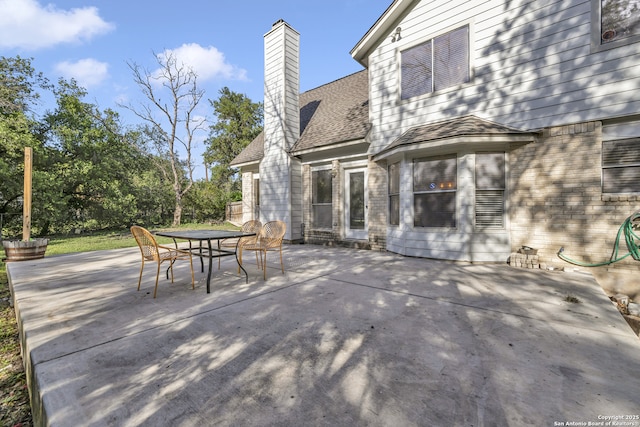 11819 Rousseau, San Antonio, TX 78251 - view of patio / terrace featuring outdoor dining area