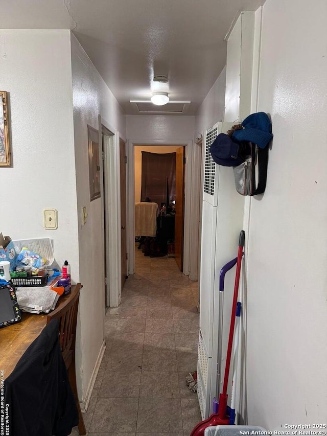 227 E Villaret Blvd, San Antonio, TX 78221 - corridor featuring attic access and tile patterned flooring