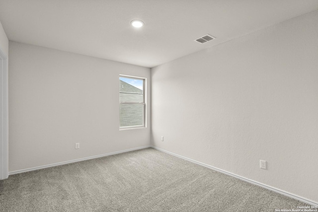 9318 Graze Land Dr, San Antonio, TX 78211 - spare room featuring carpet flooring and baseboards