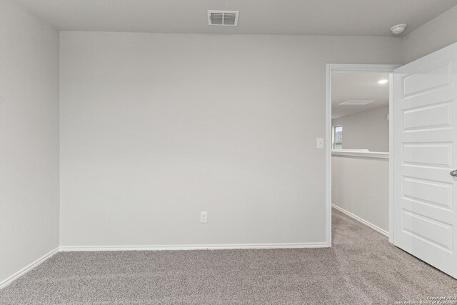 9322 Graze Br, San Antonio, TX 78211 - carpeted empty room with baseboards and a smoke detector