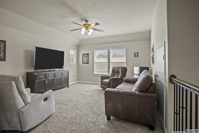 11734 Violet Cv, San Antonio, TX 78253 - carpeted living room with ceiling fan, a textured ceiling, and baseboards