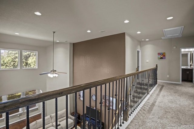 11734 Violet Cv, San Antonio, TX 78253 - hall featuring attic access, recessed lighting, light carpet, and baseboards