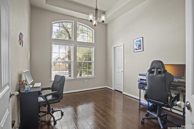 11734 Violet Cv, San Antonio, TX 78253 - office featuring healthy amount of natural light, wood finished floors, a chandelier, baseboards, and a towering ceiling