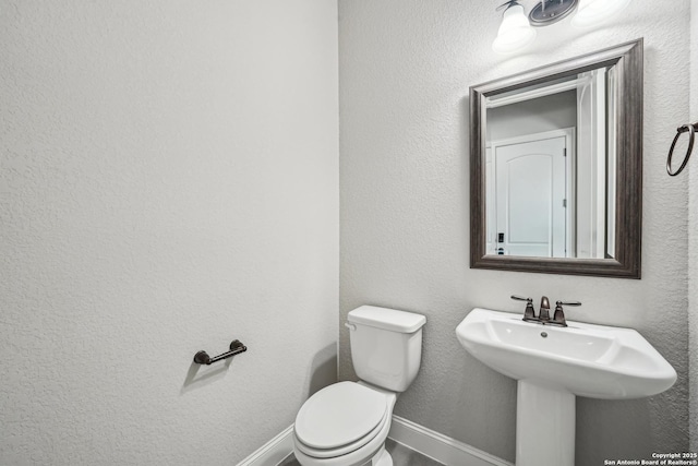 11526 Lily Blair, San Antonio, TX 78253 - bathroom featuring toilet and baseboards