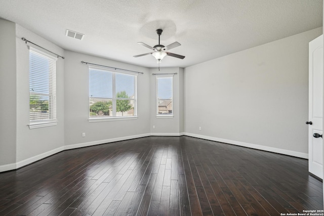 11526 Lily Blair, San Antonio, TX 78253 - empty room featuring ceiling fan, dark wood-type flooring, baseboards, and a textured ceiling