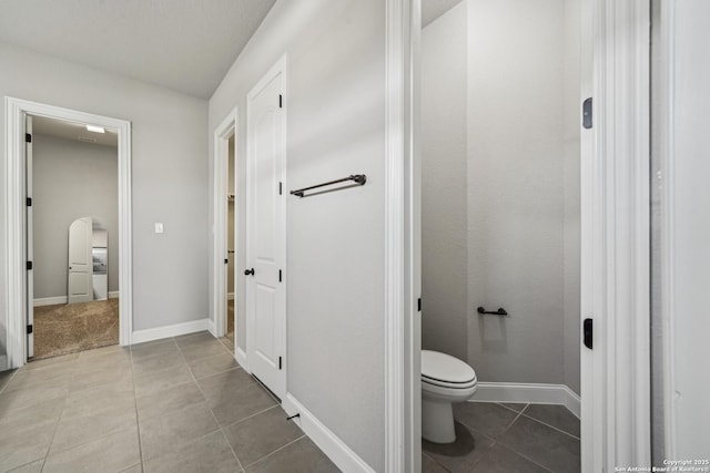 11526 Lily Blair, San Antonio, TX 78253 - bathroom with tile patterned flooring, toilet, and baseboards