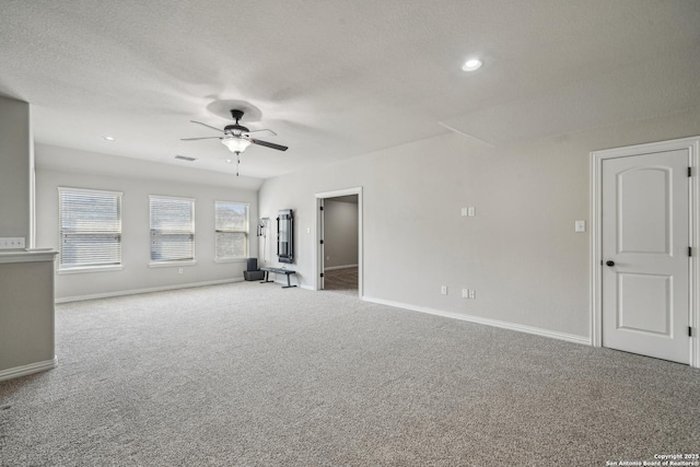 11526 Lily Blair, San Antonio, TX 78253 - unfurnished living room with a ceiling fan, carpet floors, baseboards, a textured ceiling, and recessed lighting