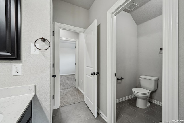 11526 Lily Blair, San Antonio, TX 78253 - bathroom featuring toilet, vanity, tile patterned flooring, and a textured ceiling