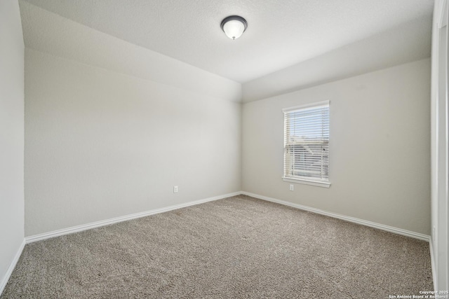 11526 Lily Blair, San Antonio, TX 78253 - carpeted empty room with baseboards and lofted ceiling