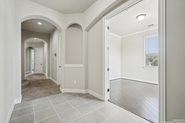 11526 Lily Blair, San Antonio, TX 78253 - hallway featuring arched walkways, baseboards, and tile patterned floors