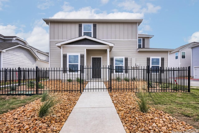 10809 Quinn Ct, San Antonio, TX 78252 - traditional-style home featuring a fenced front yard and board and batten siding