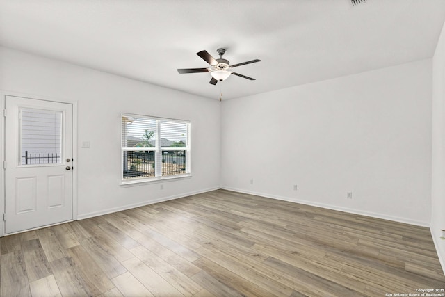 10809 Quinn Ct, San Antonio, TX 78252 - unfurnished room featuring ceiling fan, wood finished floors, and baseboards