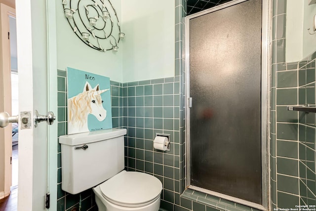 2027 Edgehill Dr, San Antonio, TX 78209 - full bath featuring tile walls, a stall shower, and toilet