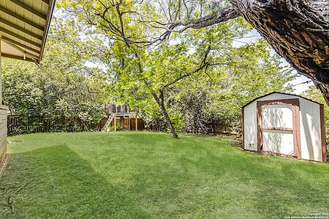 2027 Edgehill Dr, San Antonio, TX 78209 - view of yard featuring a storage unit and an outbuilding