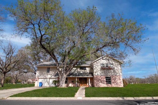 7 Glen Cove Dr, Seguin, TX 78155 - traditional home with concrete driveway, a front yard, and a garage