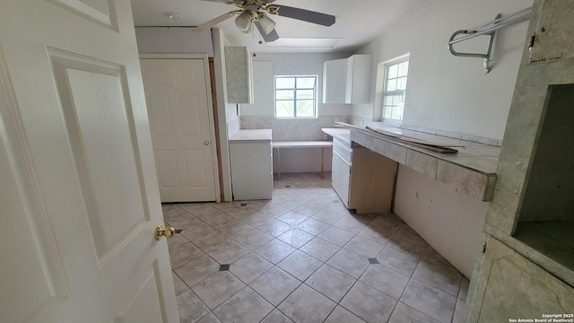7 Glen Cove Dr, Seguin, TX 78155 - bathroom with a ceiling fan, tile patterned flooring, vanity, and a tub