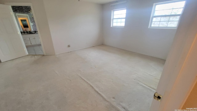 7 Glen Cove Dr, Seguin, TX 78155 - carpeted empty room featuring baseboards