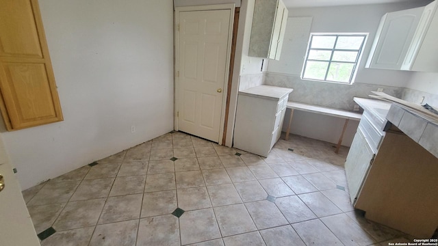 7 Glen Cove Dr, Seguin, TX 78155 - bathroom with tile patterned floors and a freestanding bath