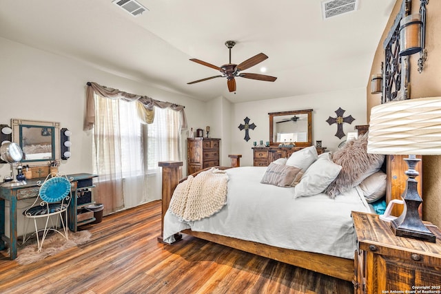bedroom with wood finished floors and a ceiling fan