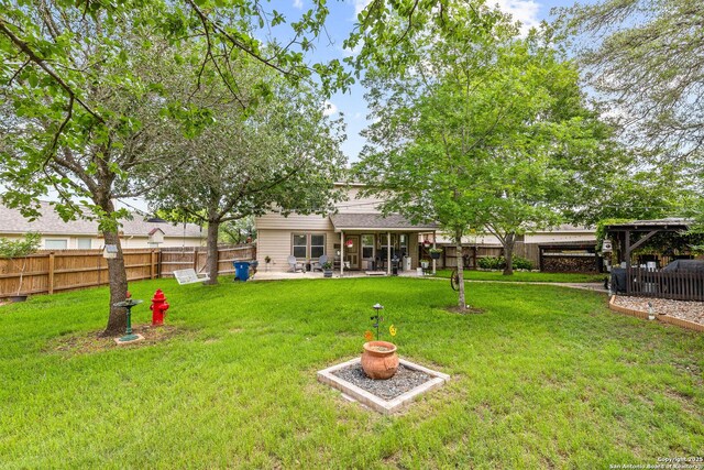 view of yard featuring a patio and a gazebo