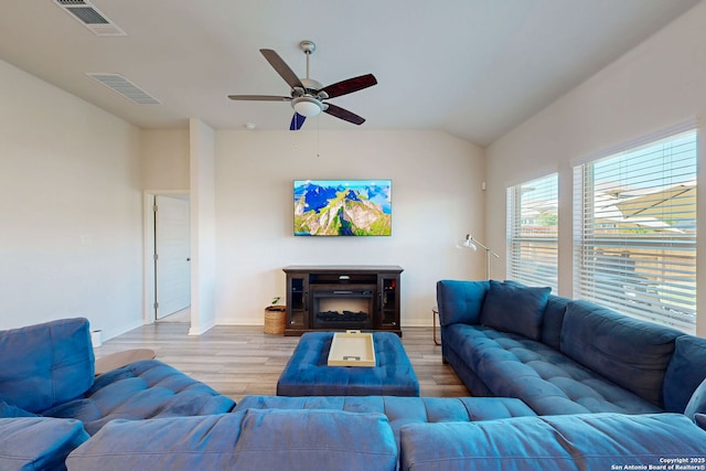 10259 Juniper Oaks, Boerne, TX 78006 - living area with wood finished floors, ceiling fan, baseboards, and lofted ceiling