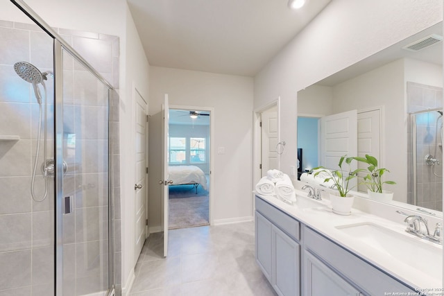 10259 Juniper Oaks, Boerne, TX 78006 - bathroom with a stall shower, double vanity, connected bathroom, ceiling fan, and baseboards