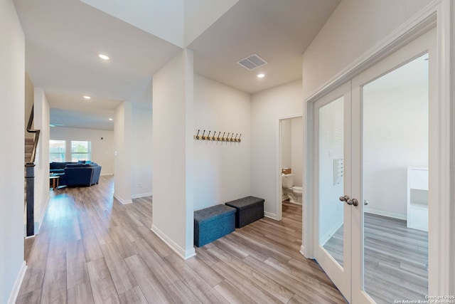 10259 Juniper Oaks, Boerne, TX 78006 - hallway featuring french doors, light wood-style flooring, baseboards, and recessed lighting