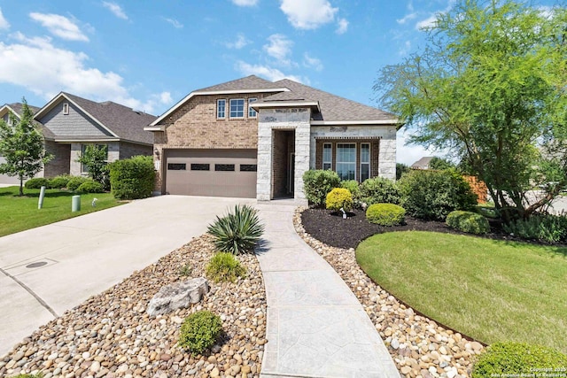 612 Wipper, New Braunfels, TX 78130 - view of front facade featuring concrete driveway, a front lawn, stone siding, a garage, and brick siding