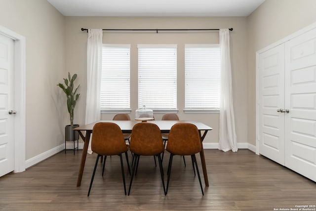 612 Wipper, New Braunfels, TX 78130 - dining room with dark wood-type flooring, plenty of natural light, and baseboards