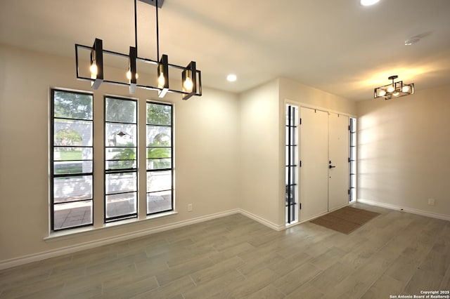 5914 Pineway, San Antonio, TX 78247 - entrance foyer featuring a chandelier, baseboards, wood finished floors, and recessed lighting