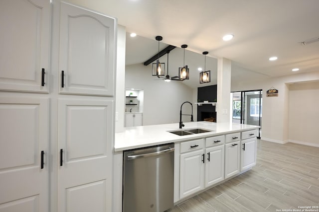 5914 Pineway, San Antonio, TX 78247 - kitchen with stainless steel dishwasher, a sink, decorative light fixtures, recessed lighting, and light countertops